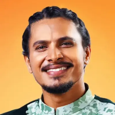 T R Dhananjayaa